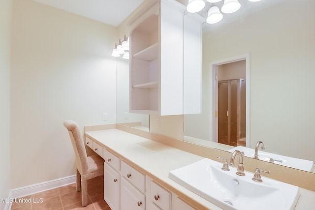 4013 Haiti St, Bay Saint Louis, MS 39520 - bathroom featuring vanity, baseboards, and tile patterned flooring