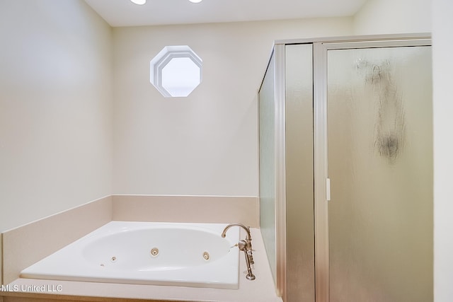 4013 Haiti St, Bay Saint Louis, MS 39520 - bathroom featuring a shower stall and a whirlpool tub