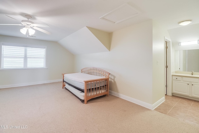 4013 Haiti St, Bay Saint Louis, MS 39520 - bedroom featuring attic access, light carpet, vaulted ceiling, and baseboards
