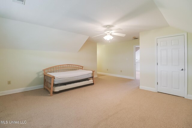 4013 Haiti St, Bay Saint Louis, MS 39520 - carpeted bedroom with lofted ceiling, visible vents, a ceiling fan, and baseboards