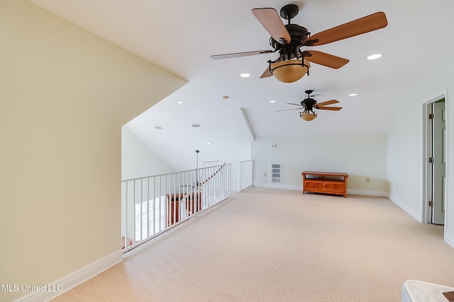 4013 Haiti St, Bay Saint Louis, MS 39520 - additional living space with recessed lighting, vaulted ceiling, baseboards, light colored carpet, and ceiling fan