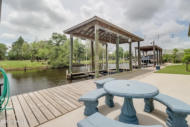 4013 Haiti St, Bay Saint Louis, MS 39520 - dock area featuring boat lift and a water view