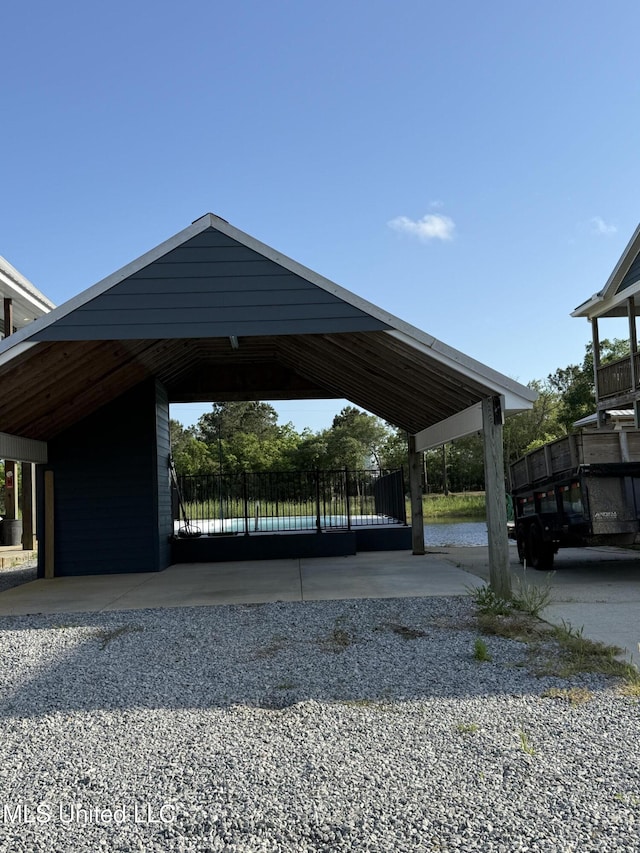 4013 Haiti St, Bay Saint Louis, MS 39520 - view of vehicle parking featuring fence