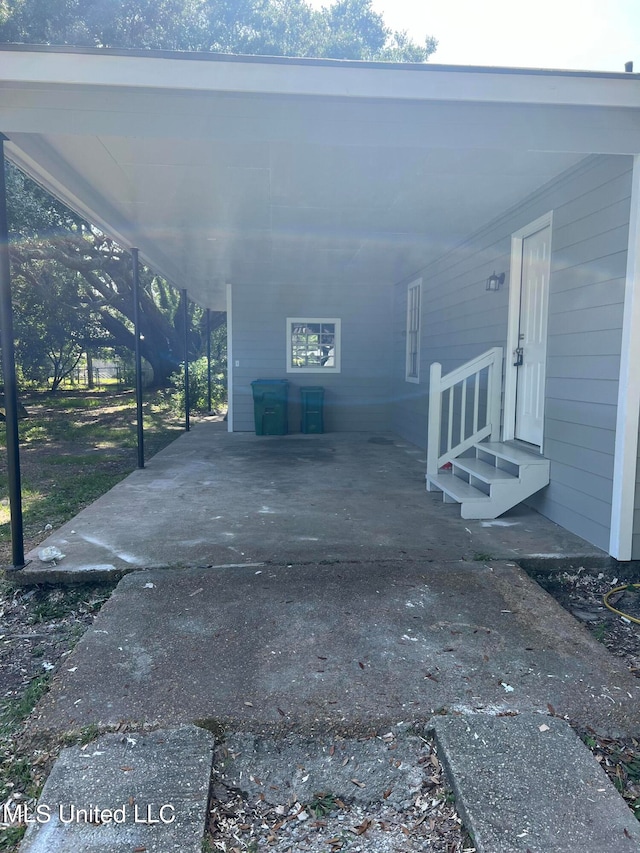 view of patio / terrace featuring a carport