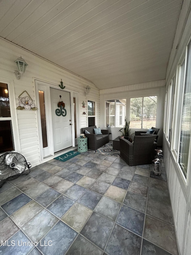 sunroom with vaulted ceiling