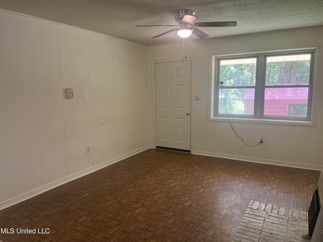 850 Friendship Rd, Ashland, MS 38603 - empty room with a ceiling fan, a textured ceiling, and baseboards