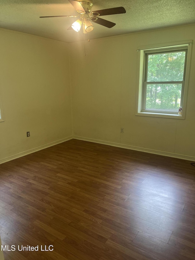 850 Friendship Rd, Ashland, MS 38603 - unfurnished room featuring dark wood-style floors, a ceiling fan, a textured ceiling, and baseboards