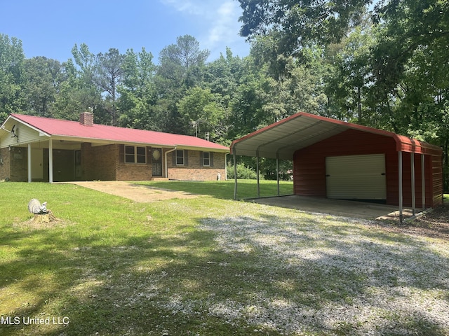 850 Friendship Rd, Ashland, MS 38603 - view of grassy yard with a detached garage and an outdoor structure