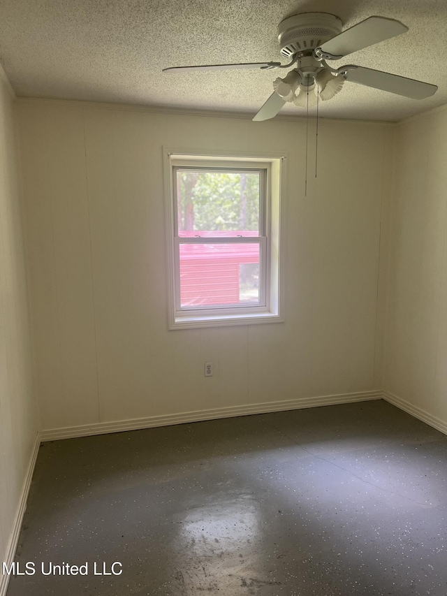 850 Friendship Rd, Ashland, MS 38603 - spare room with ceiling fan, a textured ceiling, and baseboards