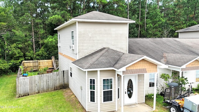 5391 Quail Creek Cir, Diberville, MS 39540 - view of front of property featuring a shingled roof and cooling unit