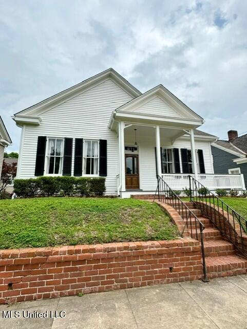 view of front of house featuring covered porch