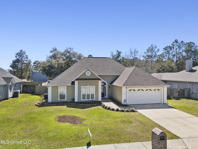 view of front of house featuring an attached garage, fence, driveway, stucco siding, and a front lawn