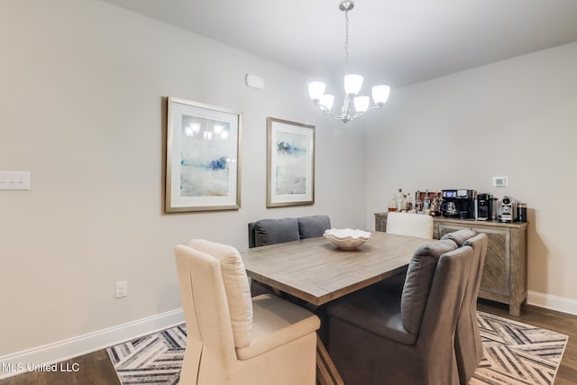 11625 Talla Dr, Ocean Springs, MS 39564 - dining space with a chandelier and wood finished floors