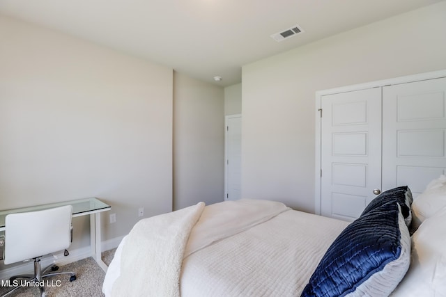 11625 Talla Dr, Ocean Springs, MS 39564 - bedroom with carpet flooring and a closet