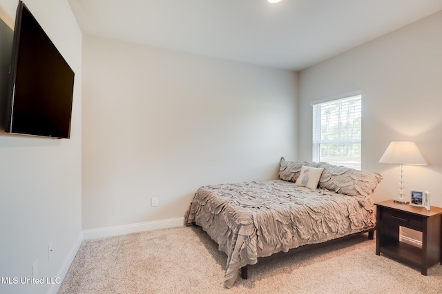 11625 Talla Dr, Ocean Springs, MS 39564 - carpeted bedroom featuring baseboards