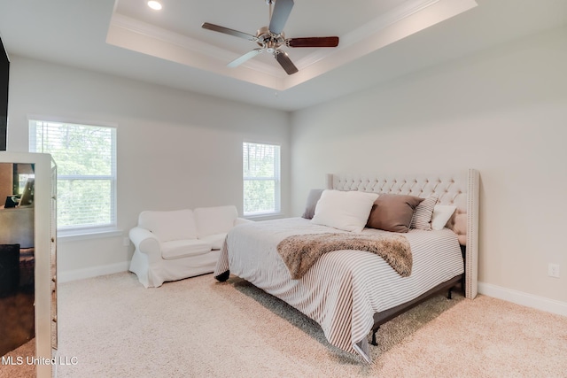 11625 Talla Dr, Ocean Springs, MS 39564 - bedroom featuring a raised ceiling, multiple windows, carpet floors, crown molding, and ceiling fan