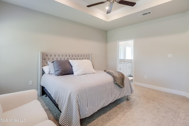 11625 Talla Dr, Ocean Springs, MS 39564 - bedroom with carpet floors, a tray ceiling, ensuite bathroom, and ceiling fan