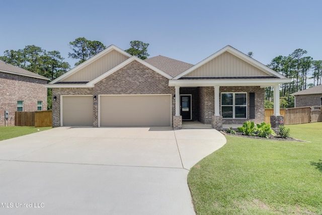 11625 Talla Dr, Ocean Springs, MS 39564 - craftsman inspired home featuring a garage, brick siding, and driveway