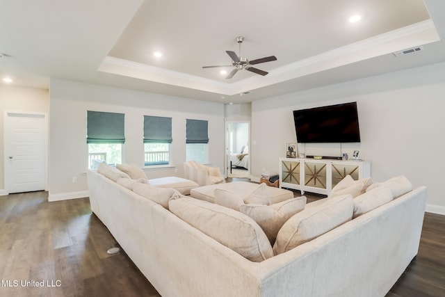 11625 Talla Dr, Ocean Springs, MS 39564 - living room featuring a raised ceiling, ceiling fan, dark wood-style flooring, ornamental molding, and recessed lighting