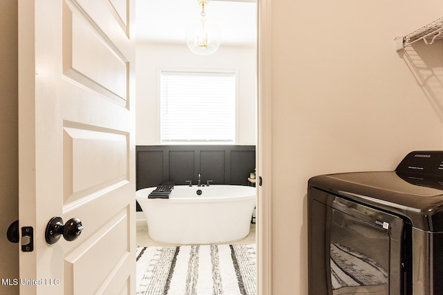 clothes washing area with laundry area