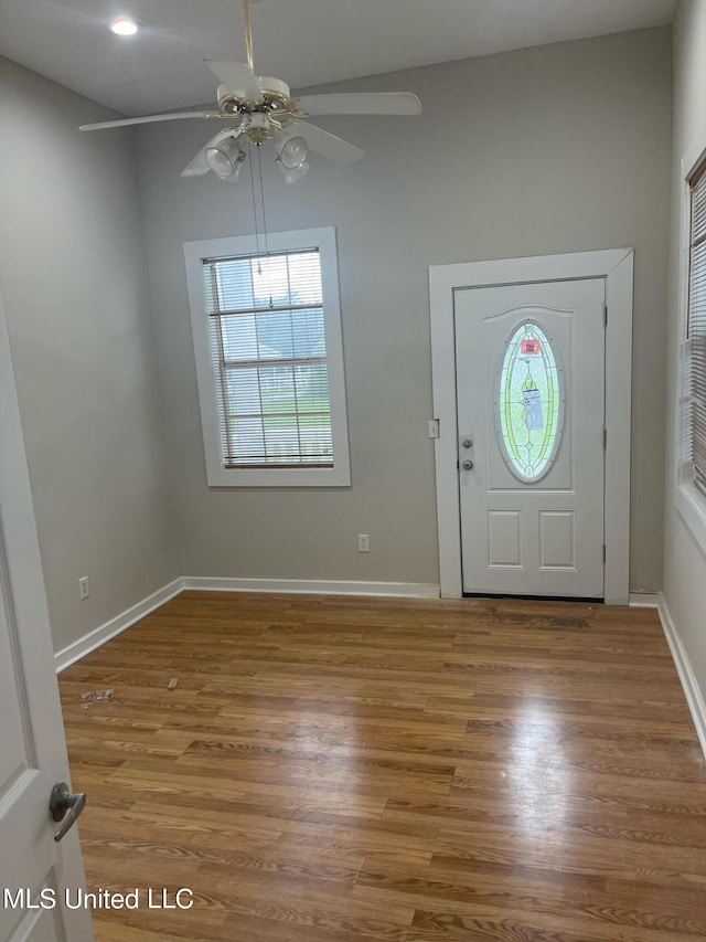 entryway featuring hardwood / wood-style floors and ceiling fan