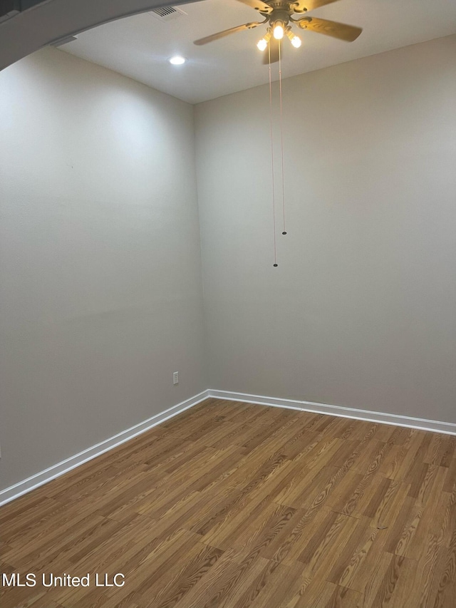 unfurnished room featuring wood-type flooring and ceiling fan