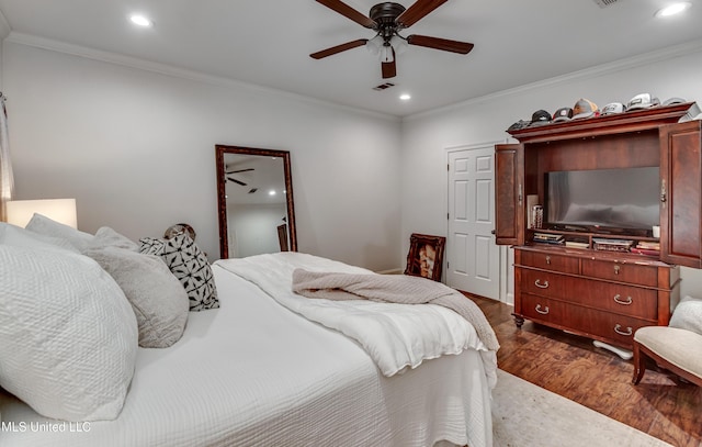 708 Oak Trl, Canton, MS 39046 - bedroom with dark wood-style flooring, ornamental molding, recessed lighting, and ceiling fan