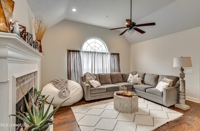 708 Oak Trl, Canton, MS 39046 - living area with ceiling fan, lofted ceiling, wood finished floors, a fireplace, and recessed lighting