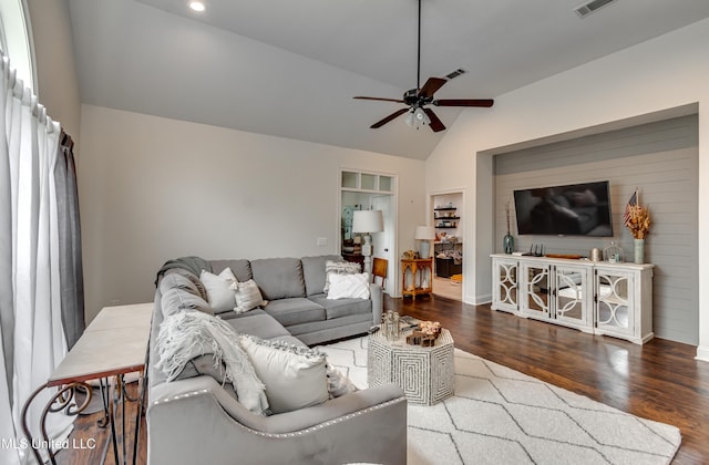708 Oak Trl, Canton, MS 39046 - living area featuring vaulted ceiling, ceiling fan, wood finished floors, baseboards, and recessed lighting