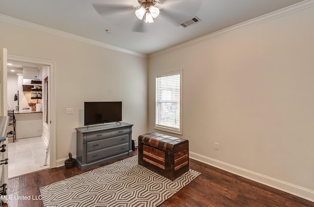 708 Oak Trl, Canton, MS 39046 - bedroom with wood finished floors, ornamental molding, baseboards, and a ceiling fan