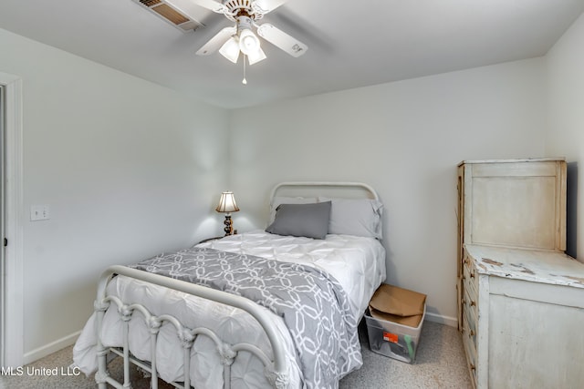 708 Oak Trl, Canton, MS 39046 - bedroom with carpet floors, baseboards, and ceiling fan
