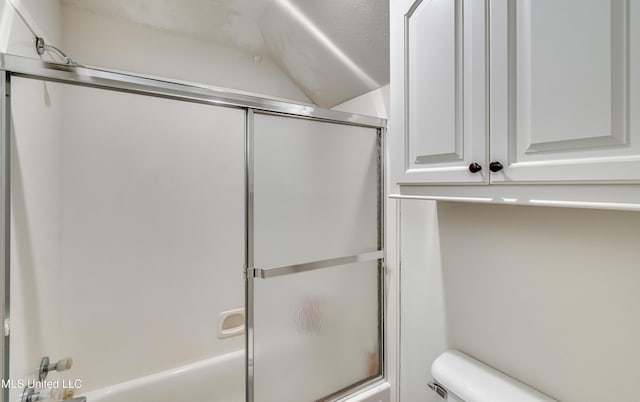 708 Oak Trl, Canton, MS 39046 - full bathroom with shower / bath combination with glass door and toilet
