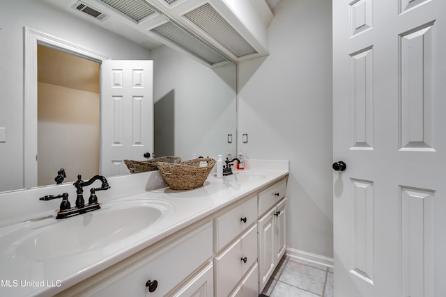 708 Oak Trl, Canton, MS 39046 - full bathroom with double vanity and baseboards