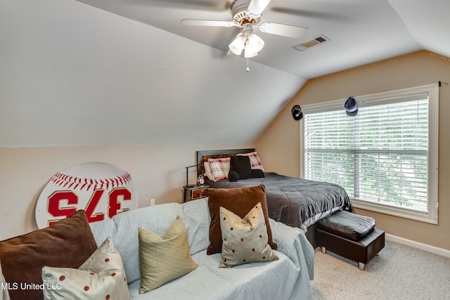 708 Oak Trl, Canton, MS 39046 - carpeted bedroom with vaulted ceiling, a ceiling fan, and baseboards