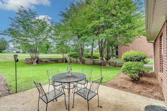 708 Oak Trl, Canton, MS 39046 - view of patio with outdoor dining area