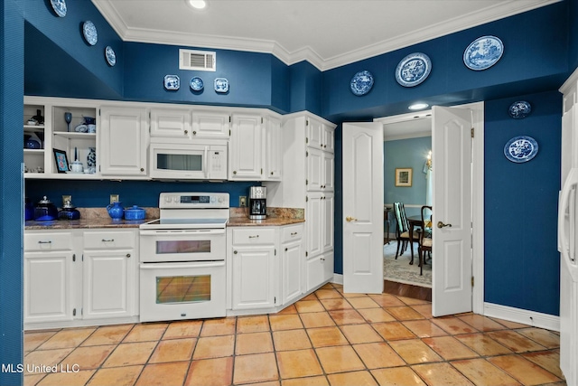 kitchen with crown molding, light tile patterned floors, white cabinets, and white appliances