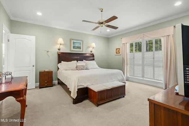 bedroom featuring recessed lighting, ornamental molding, light carpet, and a ceiling fan