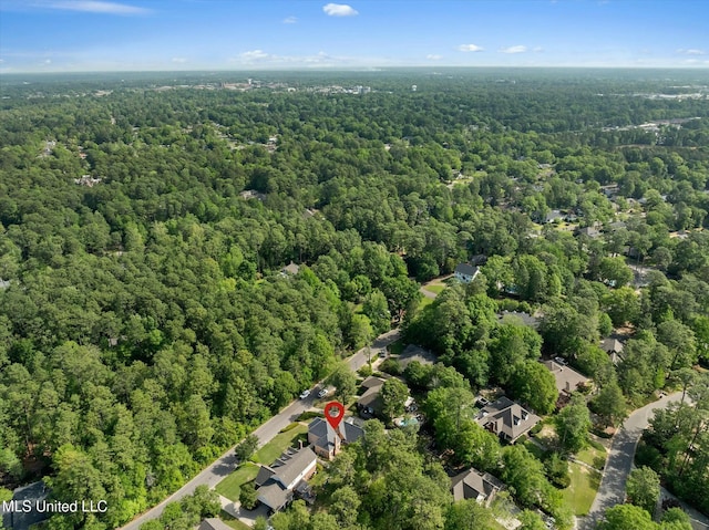 drone / aerial view with a forest view