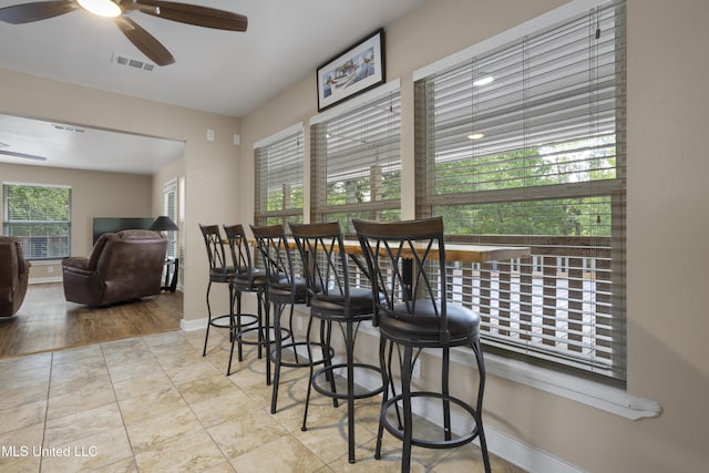 5297 Tuxachanie Dr, Biloxi, MS 39532 - dining area featuring ceiling fan and baseboards