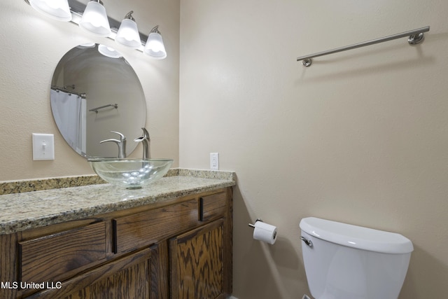 5297 Tuxachanie Dr, Biloxi, MS 39532 - bathroom featuring vanity and toilet