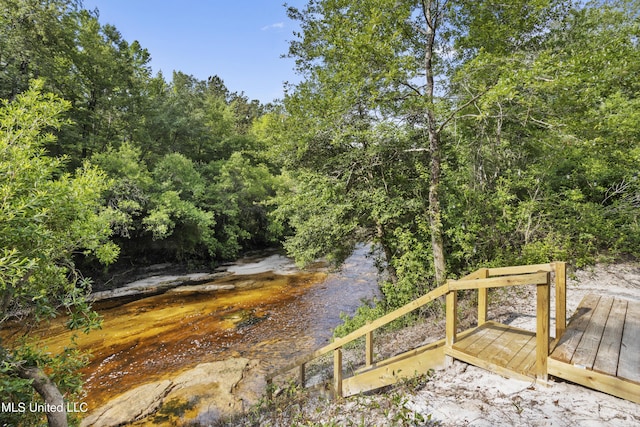 5297 Tuxachanie Dr, Biloxi, MS 39532 - view of property's community with a wooden deck