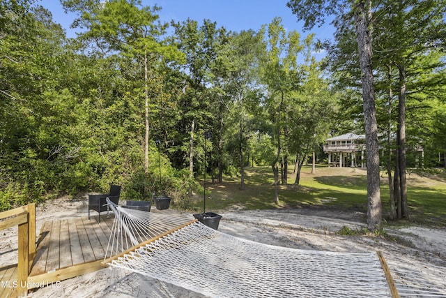 5297 Tuxachanie Dr, Biloxi, MS 39532 - wooden terrace featuring a lawn