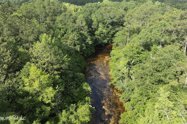 5297 Tuxachanie Dr, Biloxi, MS 39532 - aerial view of property and surrounding area featuring a heavily wooded area