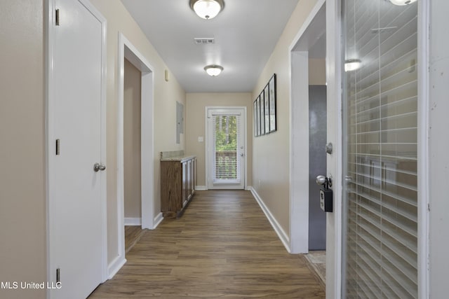 5297 Tuxachanie Dr, Biloxi, MS 39532 - corridor featuring wood finished floors, baseboards, and electric panel