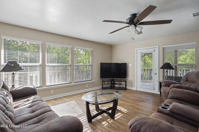 5297 Tuxachanie Dr, Biloxi, MS 39532 - living room with a ceiling fan, wood finished floors, and baseboards