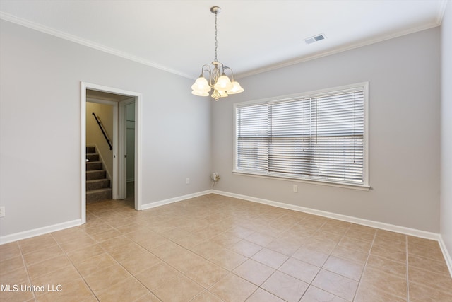 tiled empty room with a notable chandelier and ornamental molding