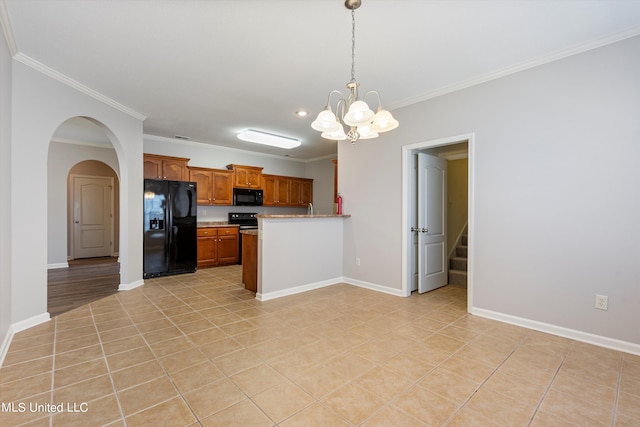 kitchen featuring hanging light fixtures, ornamental molding, light tile patterned flooring, black appliances, and a notable chandelier