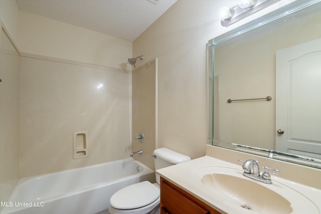 full bathroom with toilet, a textured ceiling, vanity, and washtub / shower combination