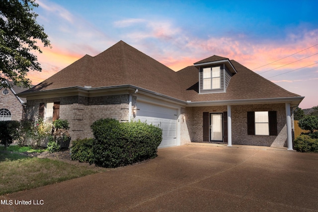 view of front of property featuring a garage