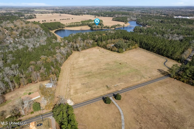 drone / aerial view featuring a rural view and a water view